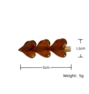 Detailed dimensions and weight of tortoiseshell amber heart side hair clip accessory