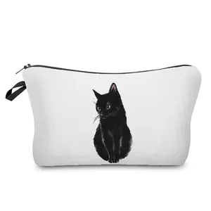 Detailed view of white cosmetic bag featuring a charming black cat illustration.