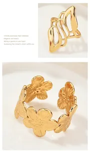 Detailed view of gold vintage floral and openwork leaf patterned rings for women.