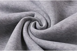 High-resolution macro detail of soft grey heathered sweatshirt fabric texture for kids clothing.