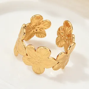 Elegant vintage golden floral open ring featuring detailed flower petal engravings