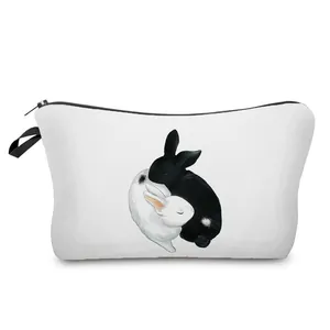 Close-up detail of a white multi-functional cosmetic bag with cute hugging rabbits illustration
