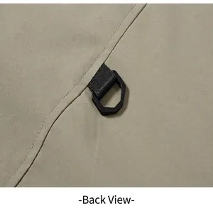 Detailed macro view of the black D-ring attachment on a khaki outdoor quick-dry fishing vest