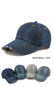 Detail of washed denim baseball cap with distressed brim and multiple color options