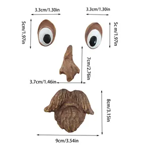 Detailed view showing precise dimensions of the resin tree monster face ornaments.