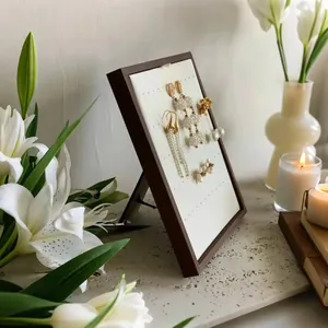 Elegant walnut wood vertical jewelry display stand for earrings and stud storage