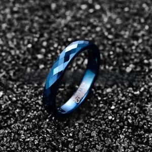 Elegant 4mm blue faceted tungsten carbide ring for men and women on black sand