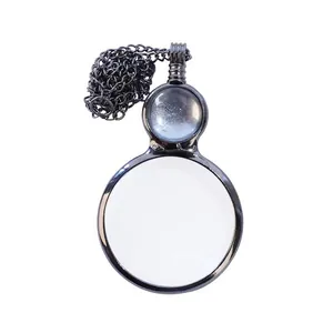 Vintage style magnifying glass necklace with decorative gunmetal finish frame and chain