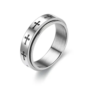 Premium anti-anxiety stainless steel spinner ring featuring engraved black cross patterns.