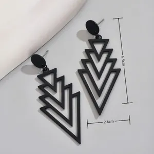 Elegant matte black geometric layered triangle earrings with fashion measurement markings