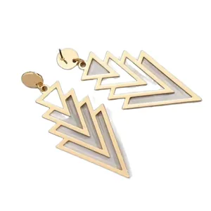 Modern geometric gold nested triangle earrings with grey enamel inlay