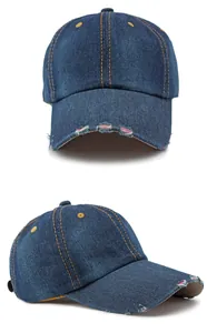 Washed denim baseball cap with distressed detailing shown from two different angles