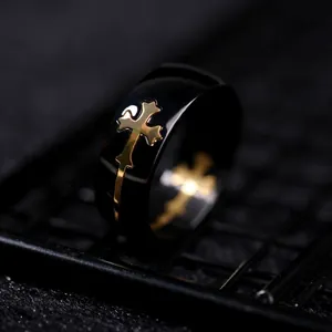 Professional men's titanium steel black ring featuring a creative gold cross inlay