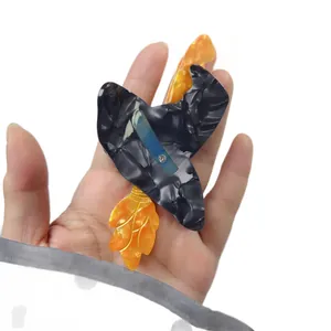 Stylish Halloween witch hat hair claw clip featuring unique orange leaf decorations