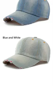 Light blue washed denim baseball cap with distressed frayed brim and classic orange stitching