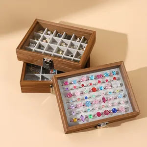 Elegant walnut wood grain jewelry storage box with clear glass lid for rings and earrings
