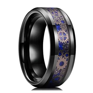 Close-up detail of 8mm black stainless steel ring with blue carbon fiber and gear inlay