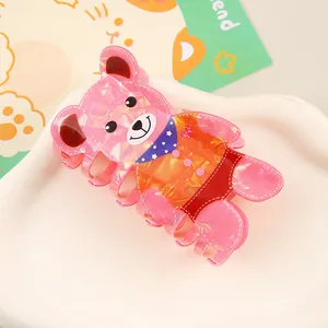 Pince à cheveux ours rose en acrylique avec fini nacré pour des coiffures festives mignonnes