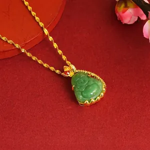 Detailed macro view of green jade Buddha pendant necklace with gold-plated copper alloy chain