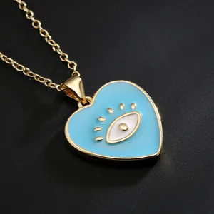 Stunning 18K gold plated heart pendant necklace featuring a blue evil eye enamel design.