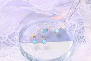 Set di gioielli in argento 925 con cristalli quadrati azzurri e finitura in oro rosa