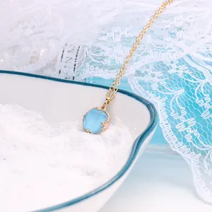 Collana rétro in argento 925 placcato oro con ciondolo quadrato in cristallo blu