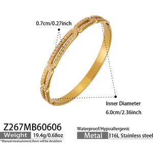 Detailed view of gold 316L stainless steel pig nose bangle with cubic zirconia stones