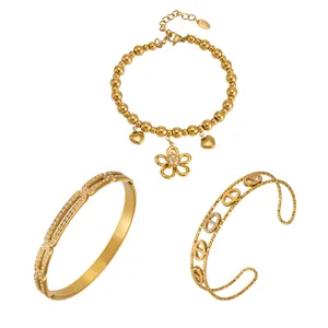 18K gold plated stainless steel jewelry set featuring flower charms and zircon bangles