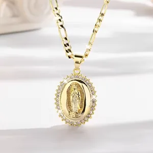 Religious gold Virgin Mary pendant necklace with rhinestone border on Figaro chain