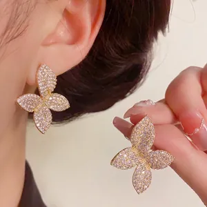 Exquisite gold-plated butterfly stud earrings with sparkling full diamond pavé crystals