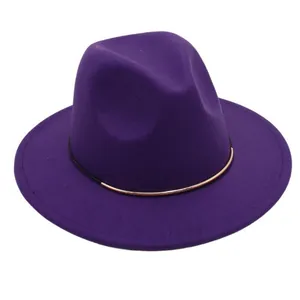 Detailed view of a purple wool felt fedora hat with a slim metallic decorative band