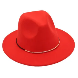Vibrant red wool felt fedora hat with gold metal band detail and flat brim
