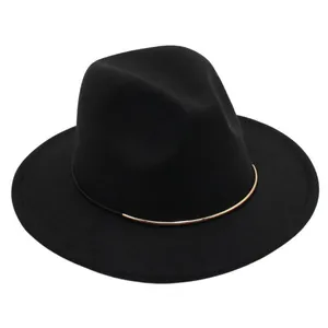 Detailed view of a classic black wool felt fedora with a minimalist gold metal band.