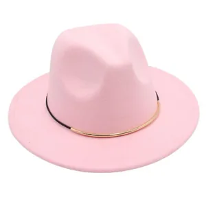 Close-up detail of a pink wool felt fedora hat with gold metal trim.