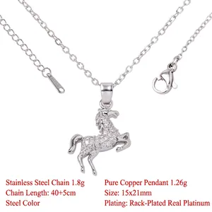 Detailed view of the sparkling horse pendant on a stainless steel chain necklace