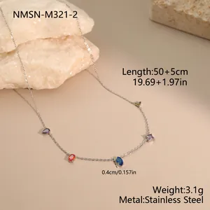 Detail view of stainless steel necklace with small vibrant multi-colored gemstones