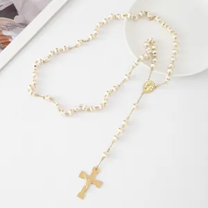 Elegant golden stainless steel rosary necklace with white beads and cross pendant