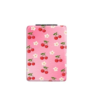 Tragbarer rechteckiger Klappspiegel mit süßem rosa Kirsch- und Blumenmuster