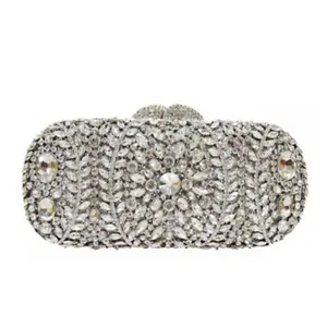 Elegant silver rhinestone evening clutch bag featuring intricate crystal leaf patterns for gala