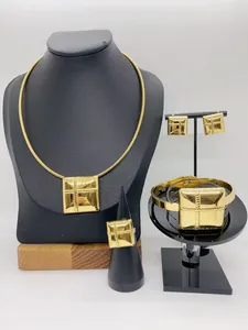 Elegant gold-plated stainless steel jewelry set featuring a square cross-pattern design