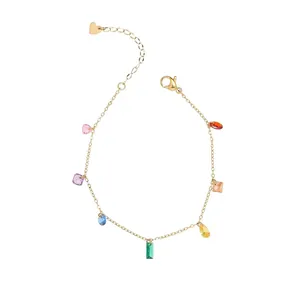Elegant detailed view of gold chain bracelet with seven colorful rainbow zircon charms