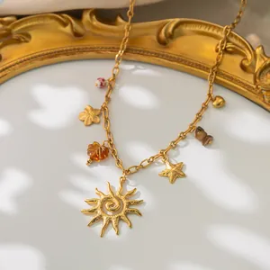 Collier bohème en acier inoxydable doré avec pendentifs soleil et étoiles divers