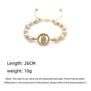 Detail of natural pearl bracelet with Virgin Mary charm, 26cm length and 10g weight.