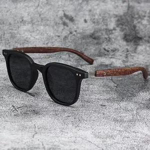 Classic sunglasses with black frames and natural wooden temples