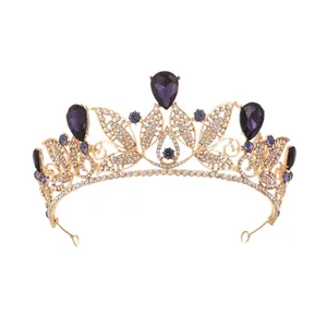 Elegant vintage gold baroque tiara with purple crystals for wedding bridal accessory.