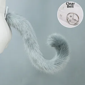 Detailed view of grey faux fur animal tail with a clear transparent waistband
