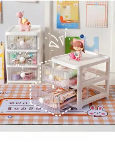 Detailed view of the transparent fluted drawers of the white desktop storage box