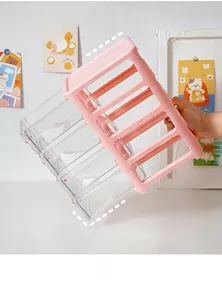 Close-up detail of anti-drop safety buckle on pink multi-layer desktop drawer organizer