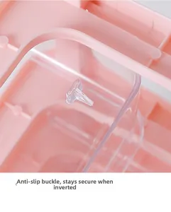 Detail of anti-drop buckle on pink desktop drawer organizer, preventing items falling.