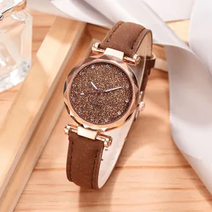 Elegant women's quartz watch featuring a brown glitter dial and frosted leather strap
